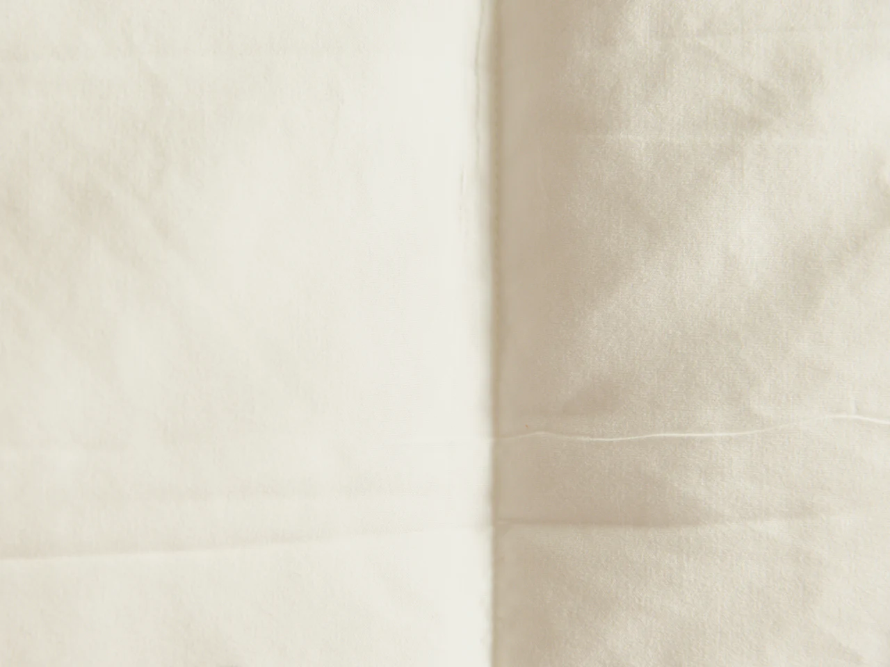 Cream fabric arranged in soft folds