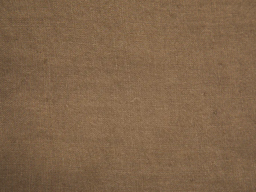 Close-up of a heavy brown canvas with a tight weave