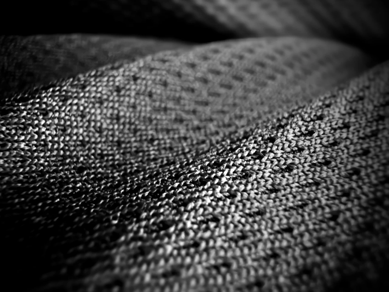 Close-up of a synthetic fabric showing its woven pattern
