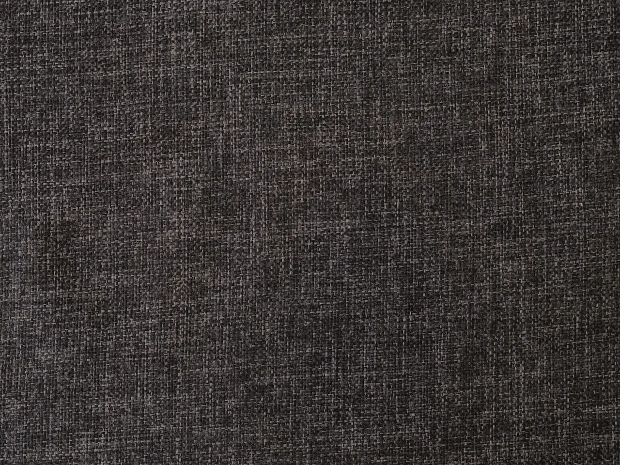 Grey wool cloth photographed close enough to show its milled surface
